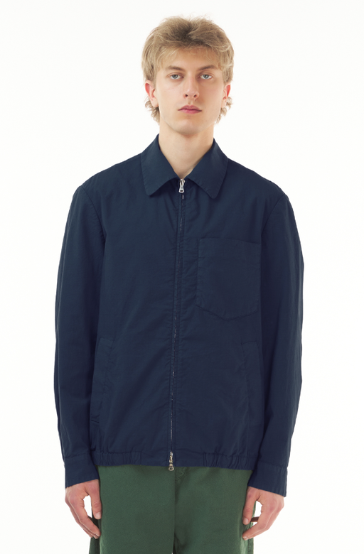A man wearing coat zaleto mariol navy shirt by Barena Venezia