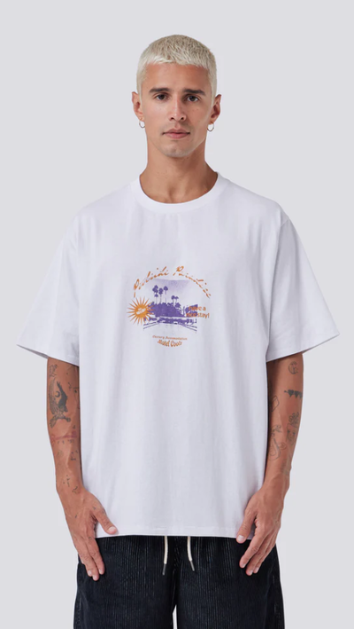 A man wearing paradise homie tee by Barney Cools in white