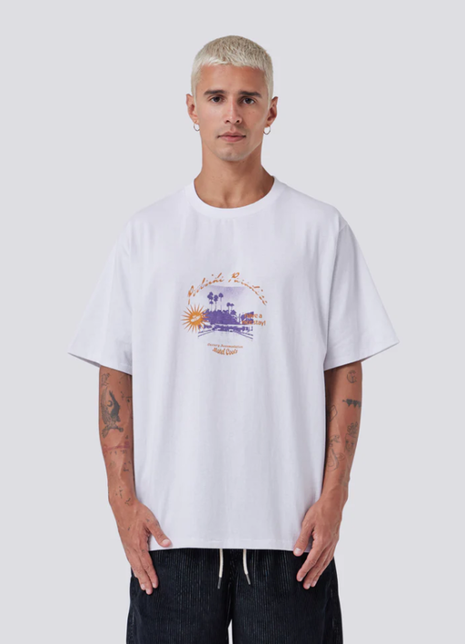 A man wearing paradise homie tee by Barney Cools in white