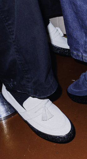 A close up of white shoes from Fast Times Melbourne