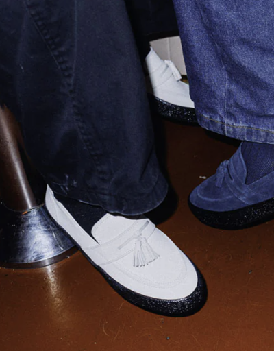 A close up of white shoes from Fast Times Melbourne