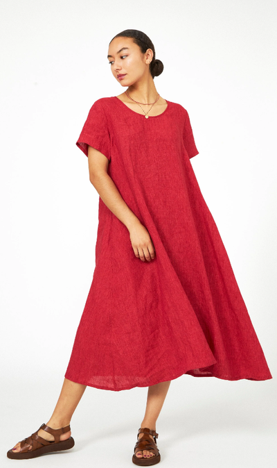 A woman wearing red dress from Lost & Found Store