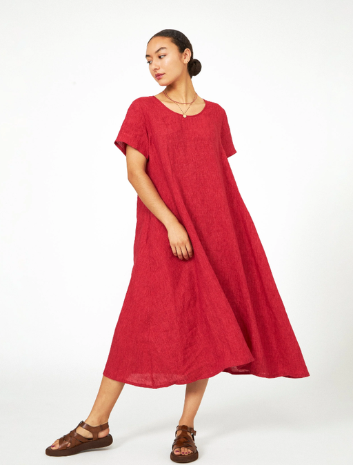 A woman wearing red dress from Lost & Found Store