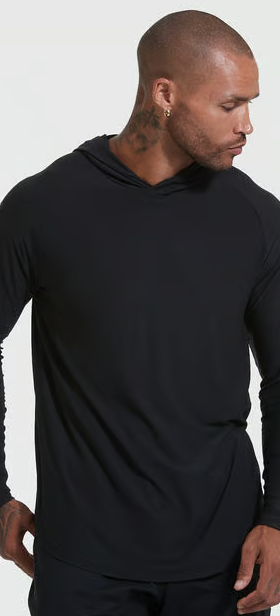 A man wearing black active True Classic hoodie
