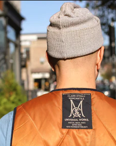 An image of a Clark Street Mercantile vest collab in orange