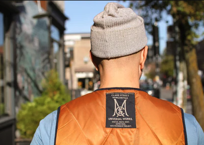 An image of a Clark Street Mercantile vest collab in orange