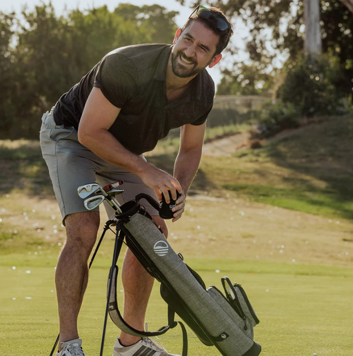 A man with the loma bag by Sunday Golf Bags