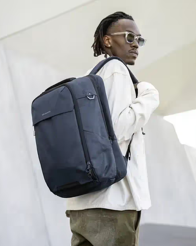 A man with black Solgaard Venture backpack