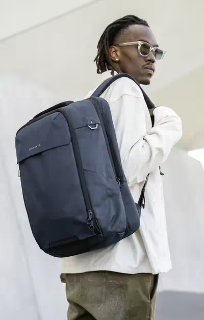 A man with black Solgaard Venture backpack