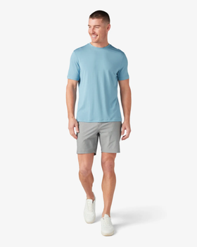 A man wearing dusty blue knox t-shirt by Mizzen+Main