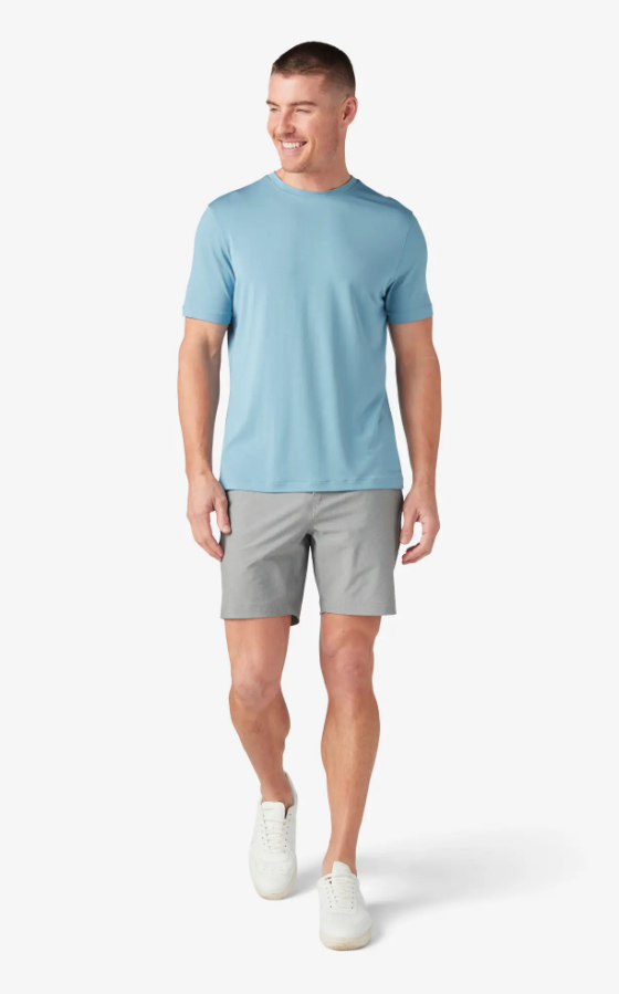 A man wearing dusty blue knox t-shirt by Mizzen+Main