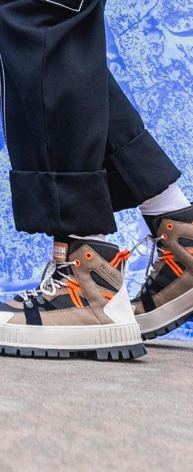 A man wearing a Palladium pallashock outcity boot