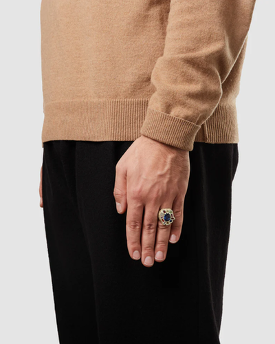 A man wearing a BLEUE BURNHAM cottage garden cocktail ring - gold