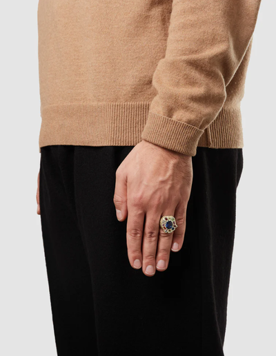 A man wearing a BLEUE BURNHAM cottage garden cocktail ring - gold