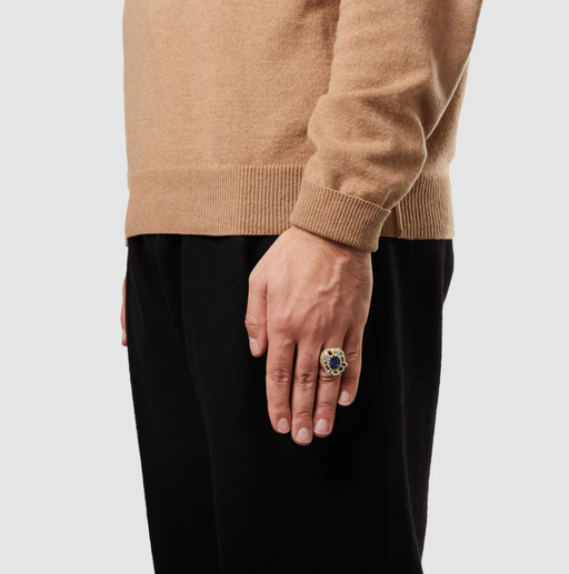 A man wearing a BLEUE BURNHAM cottage garden cocktail ring - gold
