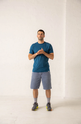 A man wearing a Druthers gots® certified organic cotton t-shirt - dusty indigo