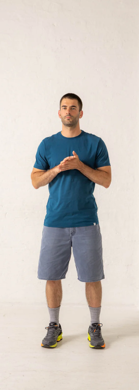 A man wearing a Druthers gots® certified organic cotton t-shirt - dusty indigo