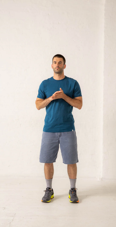 A man wearing a Druthers gots® certified organic cotton t-shirt - dusty indigo