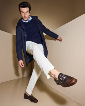 A man wearing a Allen Edmonds randolph bit loafer