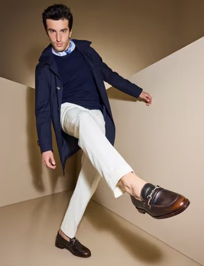 A man wearing a Allen Edmonds randolph bit loafer