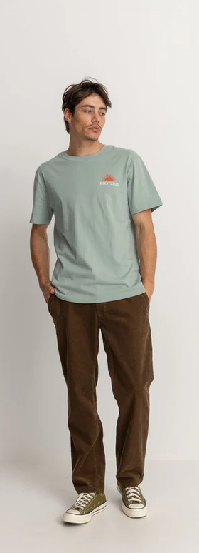 A man wearing a Rythm awake ss t shirt- seafoam
