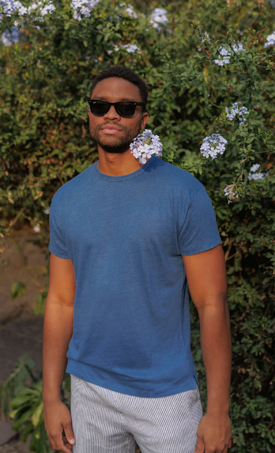 A man wearing a Alex Crane sun tee / deep ocean