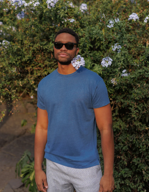 A man wearing a Alex Crane sun tee / deep ocean