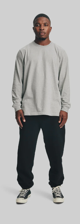 A man wearing a House of Blanks heather grey heavyweight l/s t-shirt