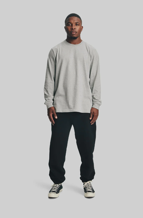 A man wearing a House of Blanks heather grey heavyweight l/s t-shirt