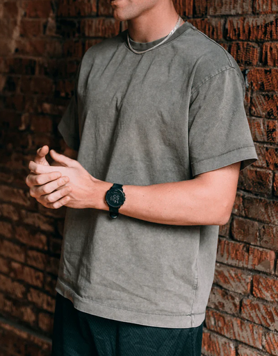 A man wearing a Minted New York vintage wash basics tee