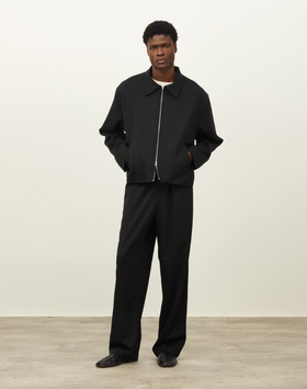 A man wearing a Daniel Simmons colorado jacket - black