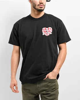 A man wearing a Empyre sad boyz by junior h heart black t-shirt
