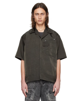 A man wearing a OUAT gray work shirt