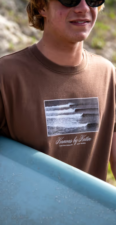 A man wearing a Katin bark color cord tee