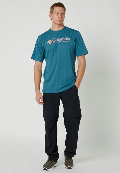 A man wearing a Insight cloudburst color csc basic logo short sleeve