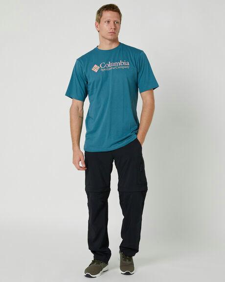 A man wearing a Insight cloudburst color csc basic logo short sleeve