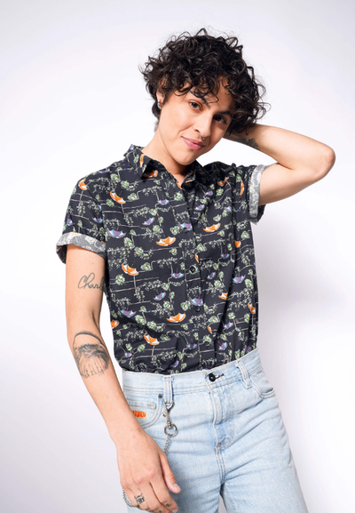 A woman wearing Wildfang the boxtrolls© button up by laika x wildfang
