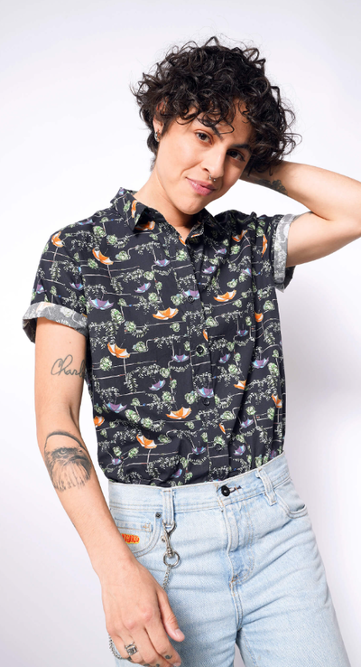 A woman wearing Wildfang the boxtrolls© button up by laika x wildfang