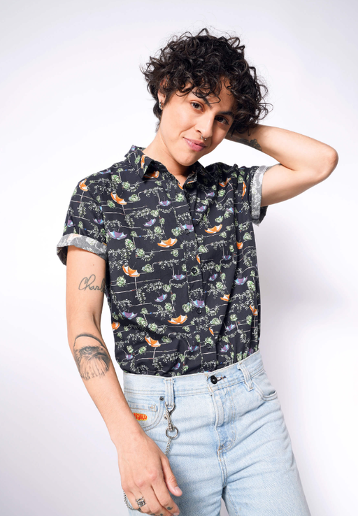 A woman wearing Wildfang the boxtrolls© button up by laika x wildfang