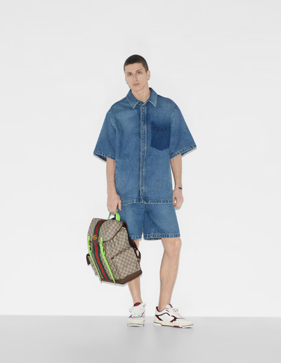 A man carrying Gucci Kids ophidia gg medium backpack