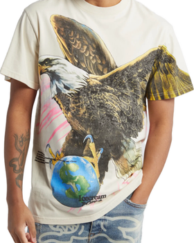 A man wearing Jugrnaut icecream fear of a rich planet s/s knit antique white