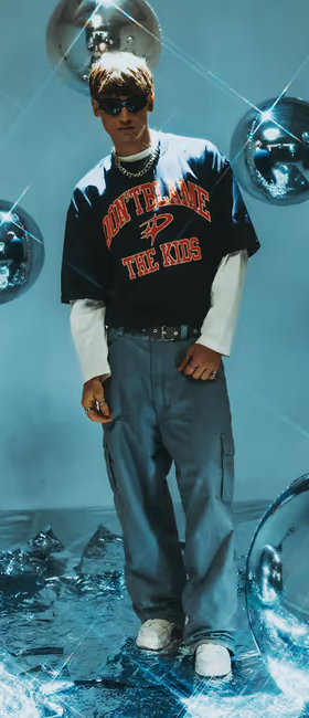 A man wearing DBTK arc tee - navy blue