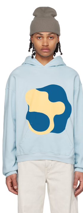 A man wearing full circle energy's blue hoodie