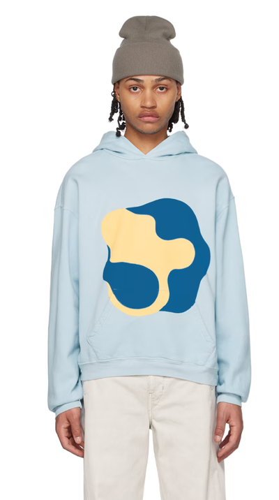A man wearing full circle energy's blue hoodie