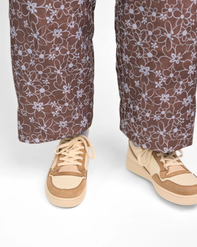 A man wearing GOOD NEWS Slippers mack oatmeal shoe