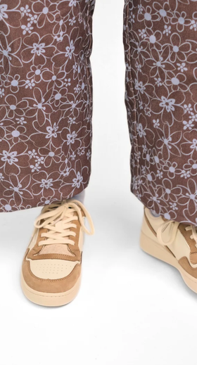 A man wearing GOOD NEWS Slippers mack oatmeal shoe