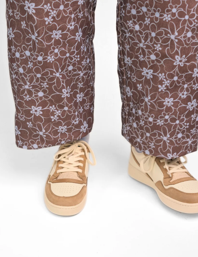 A man wearing GOOD NEWS Slippers mack oatmeal shoe