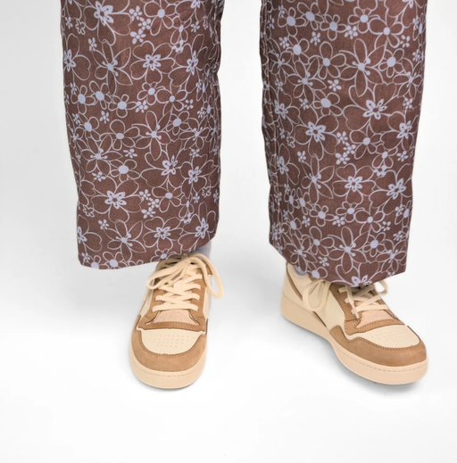 A man wearing GOOD NEWS Slippers mack oatmeal shoe
