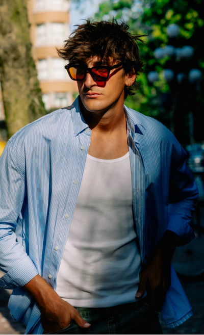 A man wearing Drypond Eyewear koya - forest green sunglass