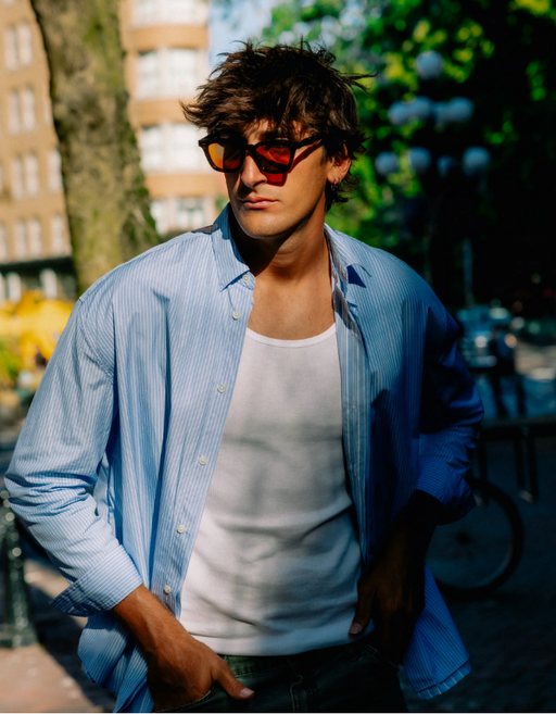 A man wearing Drypond Eyewear koya - forest green sunglass
